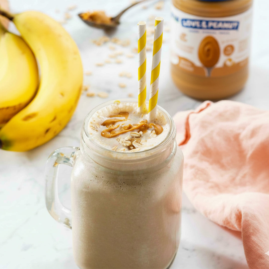 Peanut butter banana shake with a straw